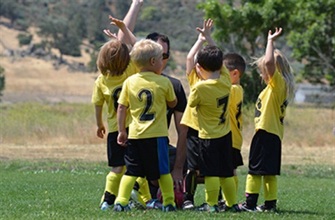 Children playing a team sport