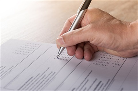 Person filling out form