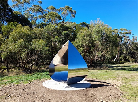 The Drop artwork sitting in the landscape at Glenlyon dam