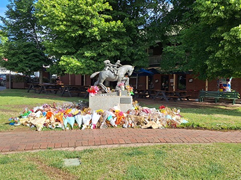 Tributes of flowers and gifts in Dayleford at accident site