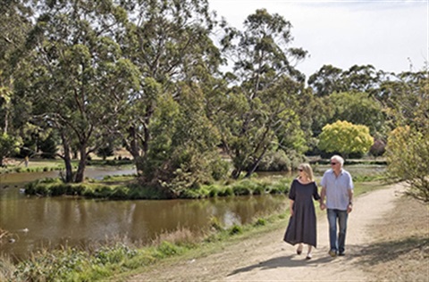 People walking on a path at Quarry Street Reserve in Trentham
